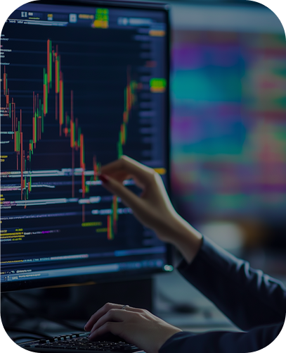 Person's hands pointing at a financial chart on a screen | It Outsourcing | Parallel Outsourcing